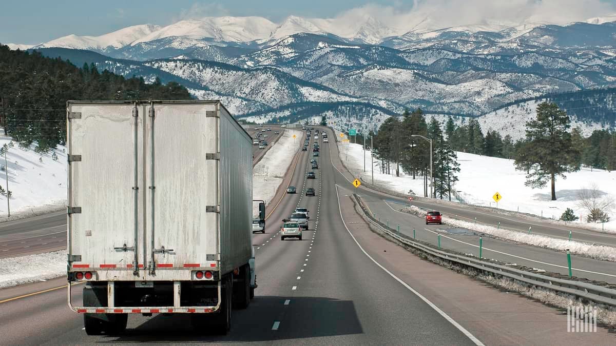 Tractor-trailer heading down a stretch of I-70 in Colorado.