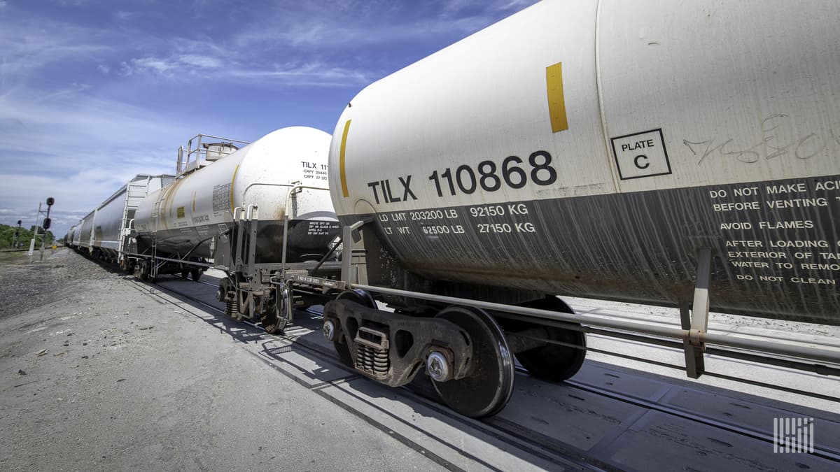 A photograph of tank cars in a rail yard.