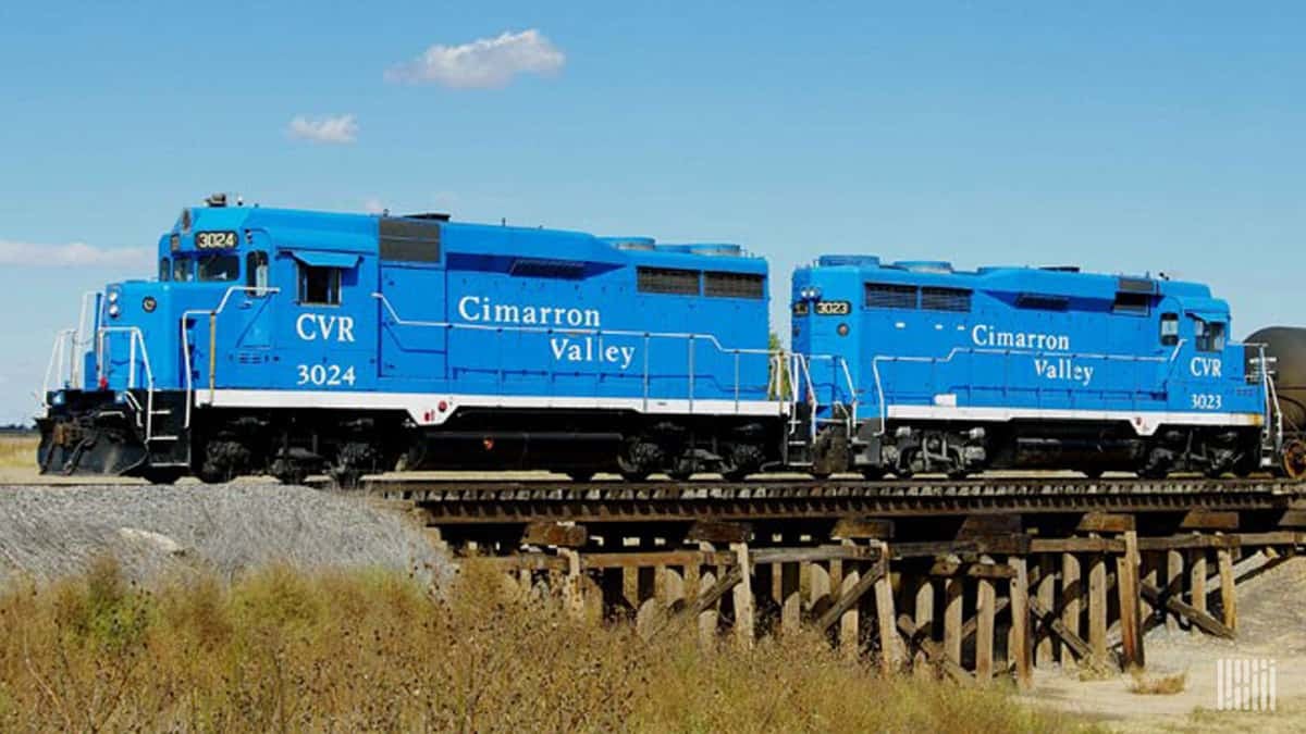 A photograph of a Cimarron Valley Railroad train crossing a bridge.