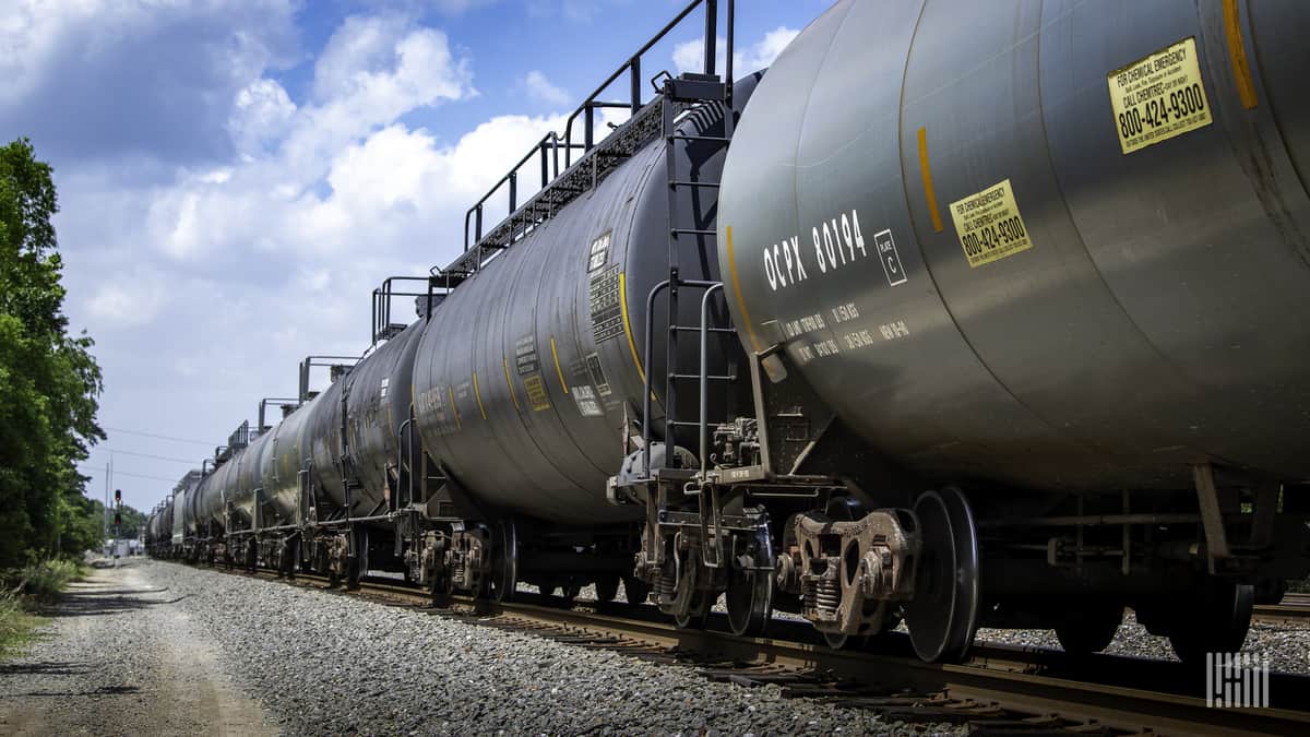 A photograph of a train of tank cars.