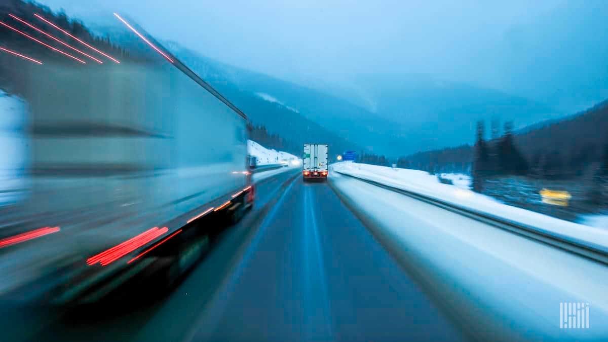 Trucks on snowy highway