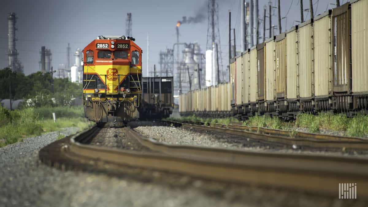 A photograph of a Kansas City Southern train in a rail yard.