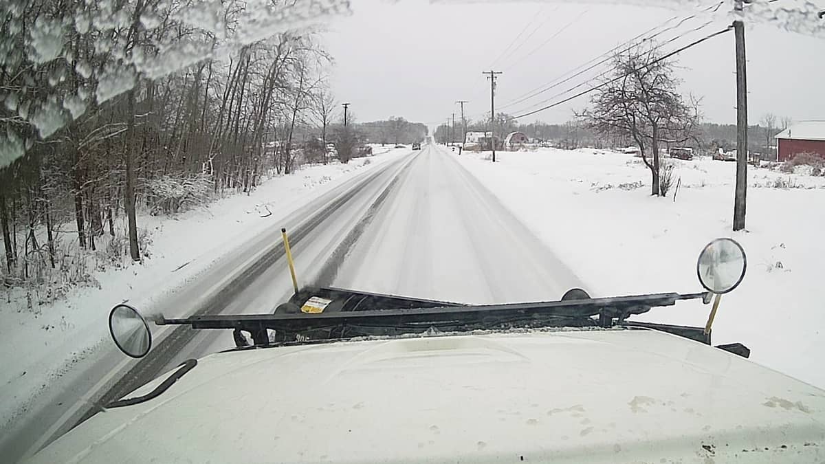 Snow plow clearing an Ohio highway.