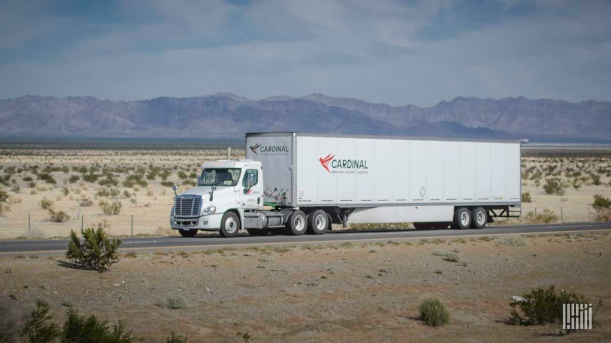 A Cardinal Logistics tractor-trailer on a road. Hackers recently leaked data stolen from the trucking company.