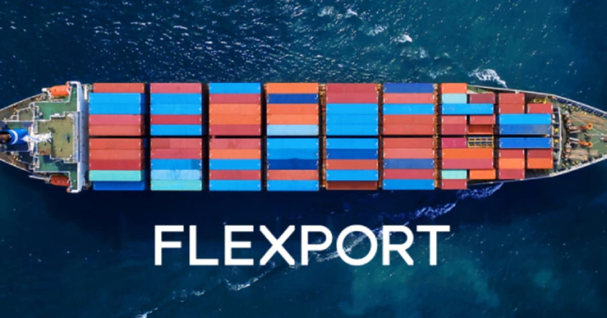 Container vessel image looking down from the air. Flexport logo on the water.