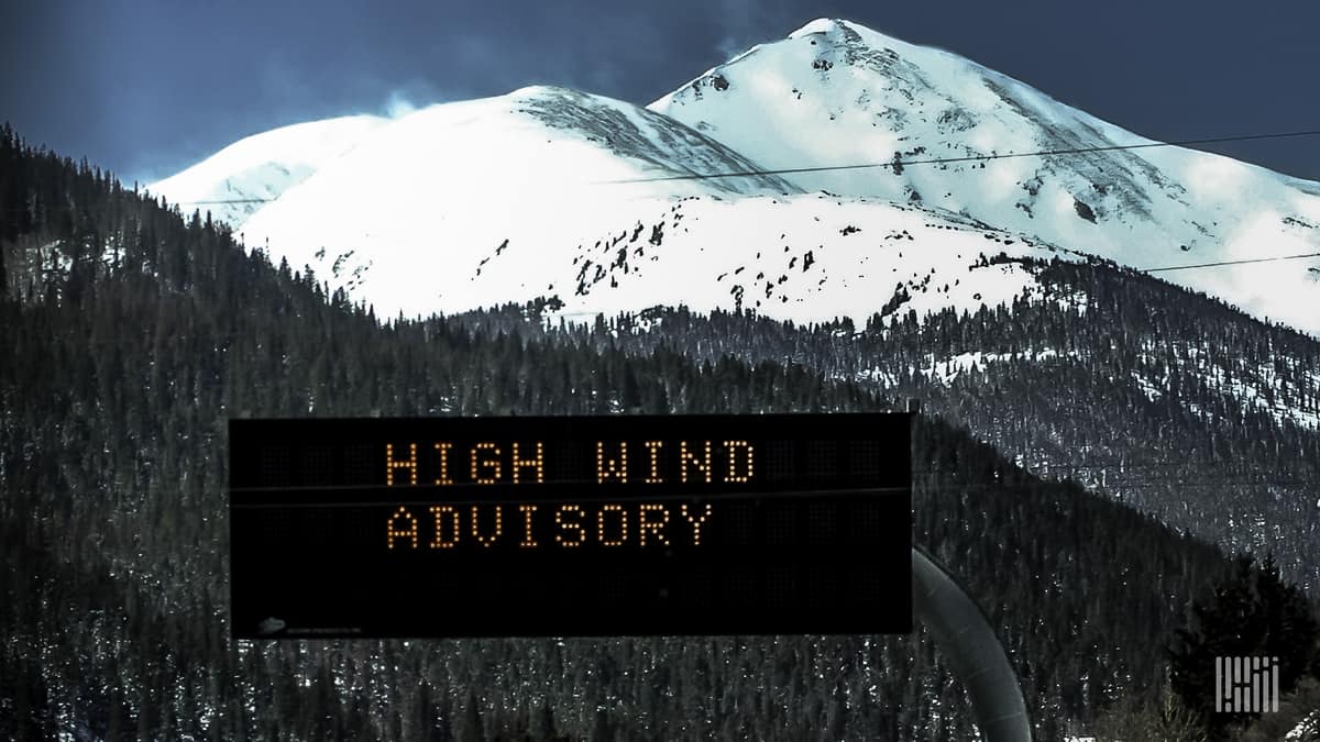 "High Wind Advisory" digital sign along a mountain highway.