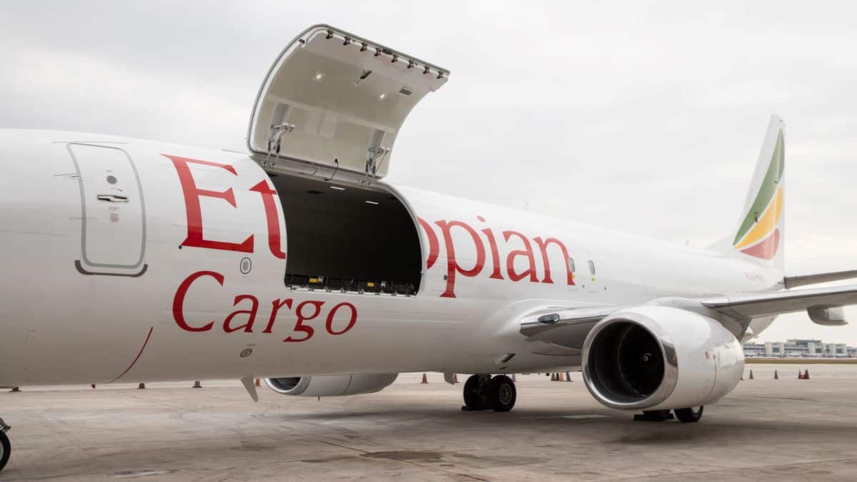 An Ethiopian Airlines cargo plane with side door open.