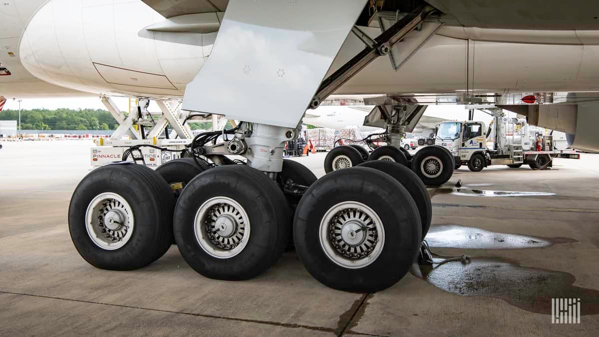 Close of landing gear on a large jet.