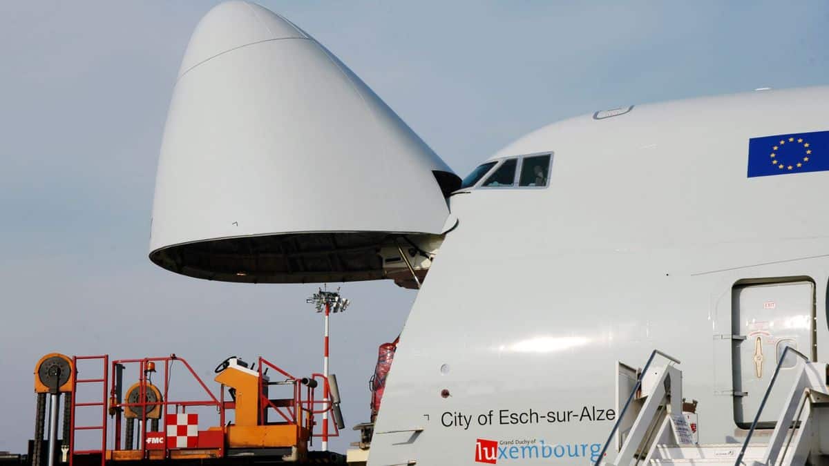 Nose cone of a 747 jumbo freighter is open so cargo can be loaded.