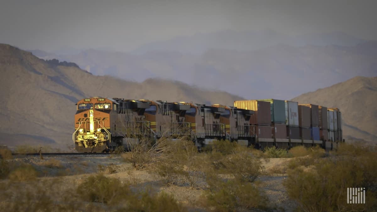 A photograph of a train hauling intermodal containers.