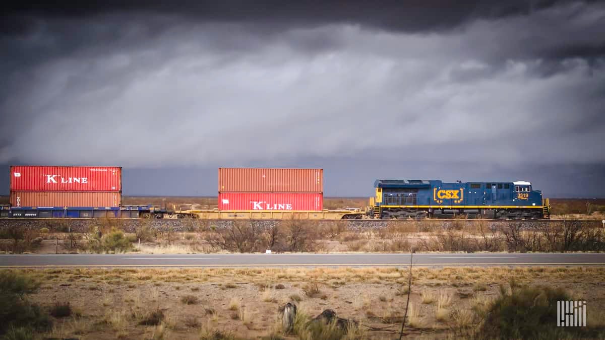 A photograph of a CSX train hauling intermodal containers.