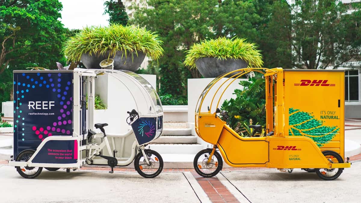 Companies like REEF Technology and DHL are deploying an increasing number of e-cargo bikes for last-mile delivery.