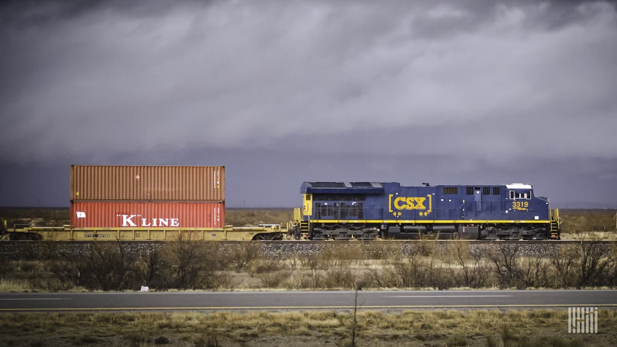 A photograph of a CSX train hauling intermodal containers.