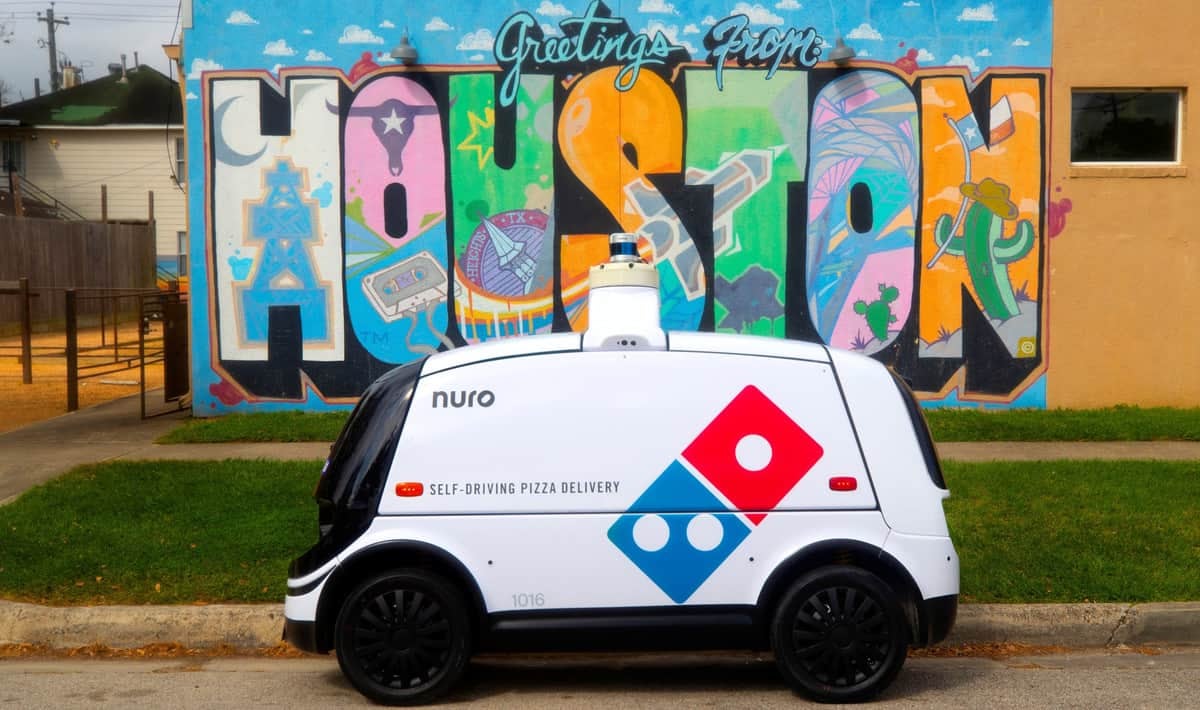 Nuro R2 self-driving robot delivering Domino's pizza in Houston