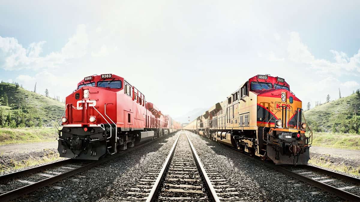 A photograph of two locomotives. One is from Canadian Pacific and the other is from Kansas City Southern.