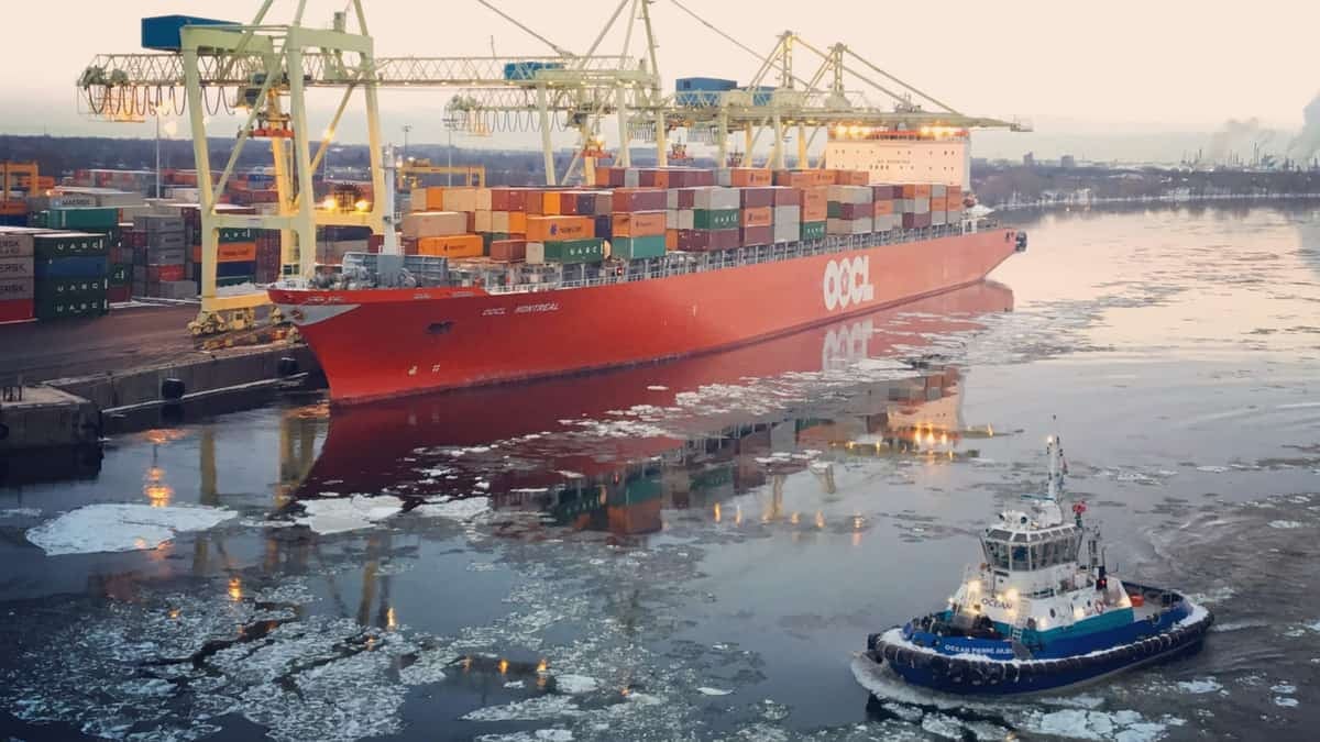 A container ship docked at the Port of Montreal, where longshoremen are set to begin a partial strike.