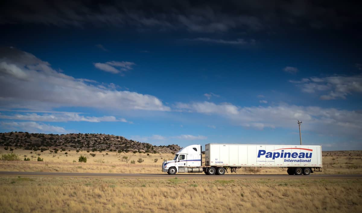 A tractor-trailer of TFI International carrier Papineau.