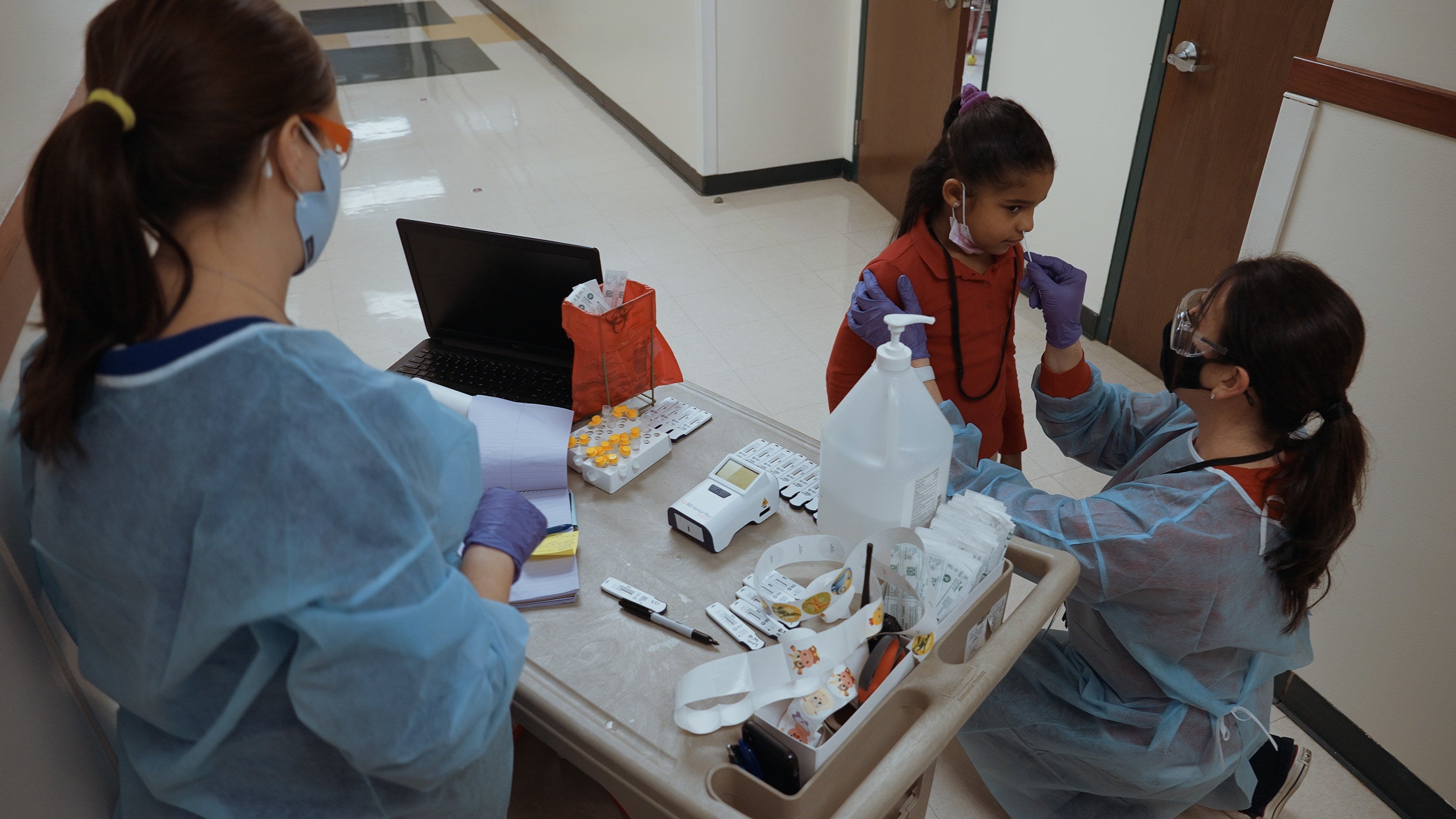 An elementary school student is tested for COVID-19 using a rapid test made by Becton, Dickinson and Company. (Photo: BD)