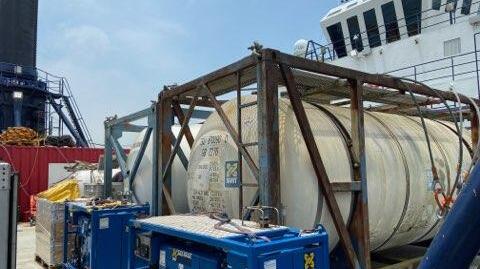 Portable tanks full of diesel fuel drained from the capsized lift boat SEACOR Power.