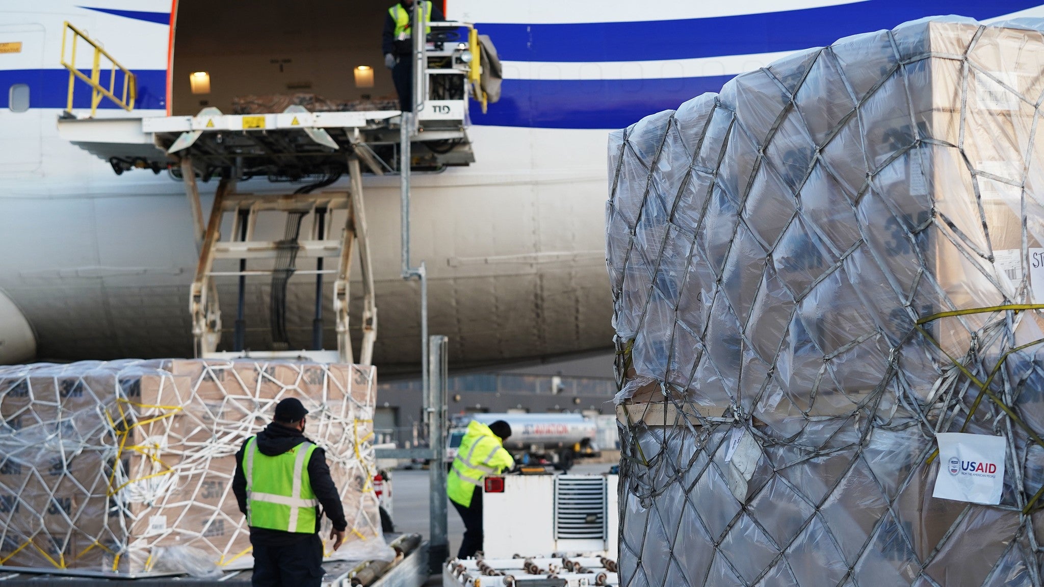 Workers load medical supplies from the U.S. Agency for International Development on to a plane bound for India. (Photo: USAID/Patrick Moore)