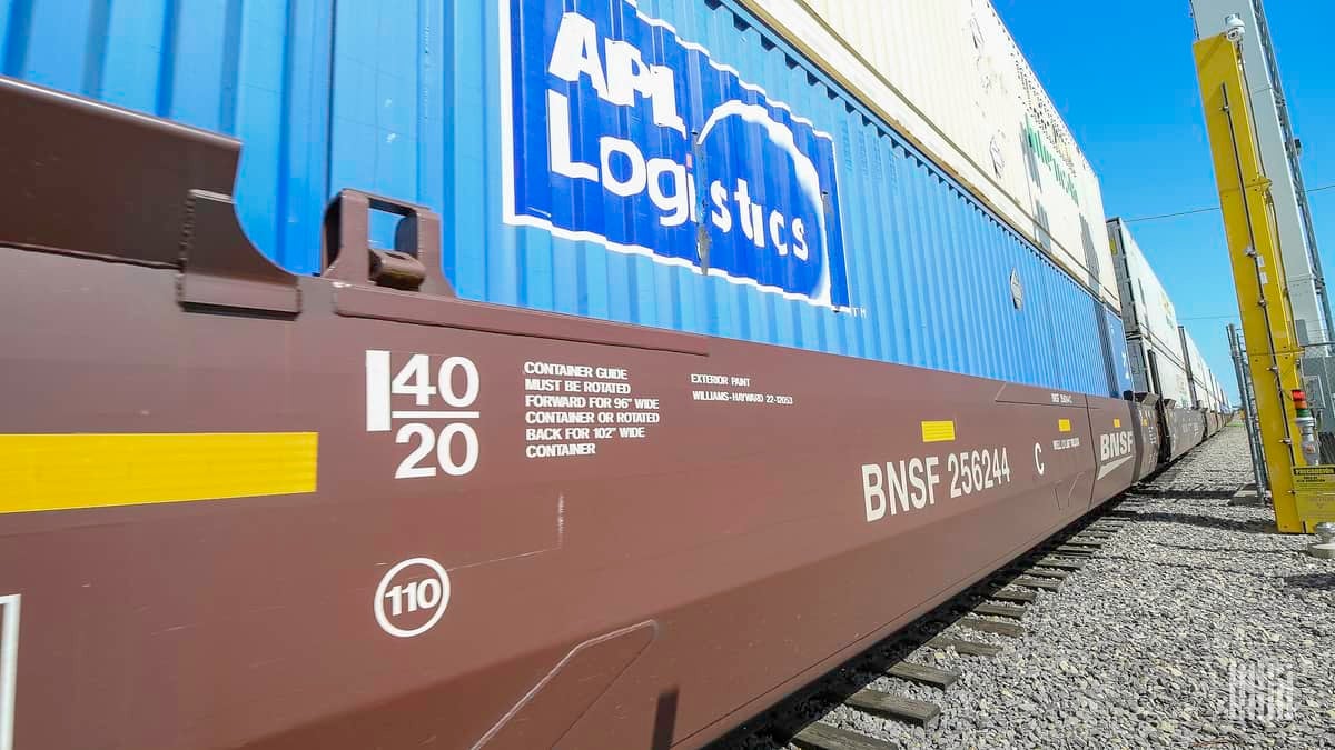 A photograph of a train hauling intermodal containers.