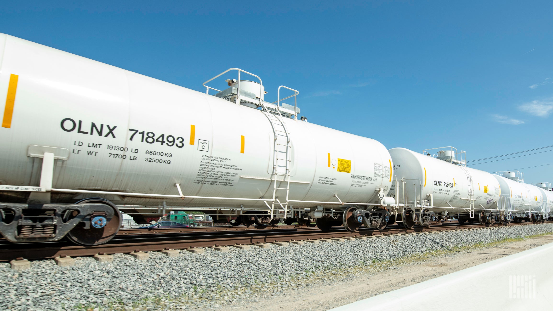 A photograph of a train of tank cars.