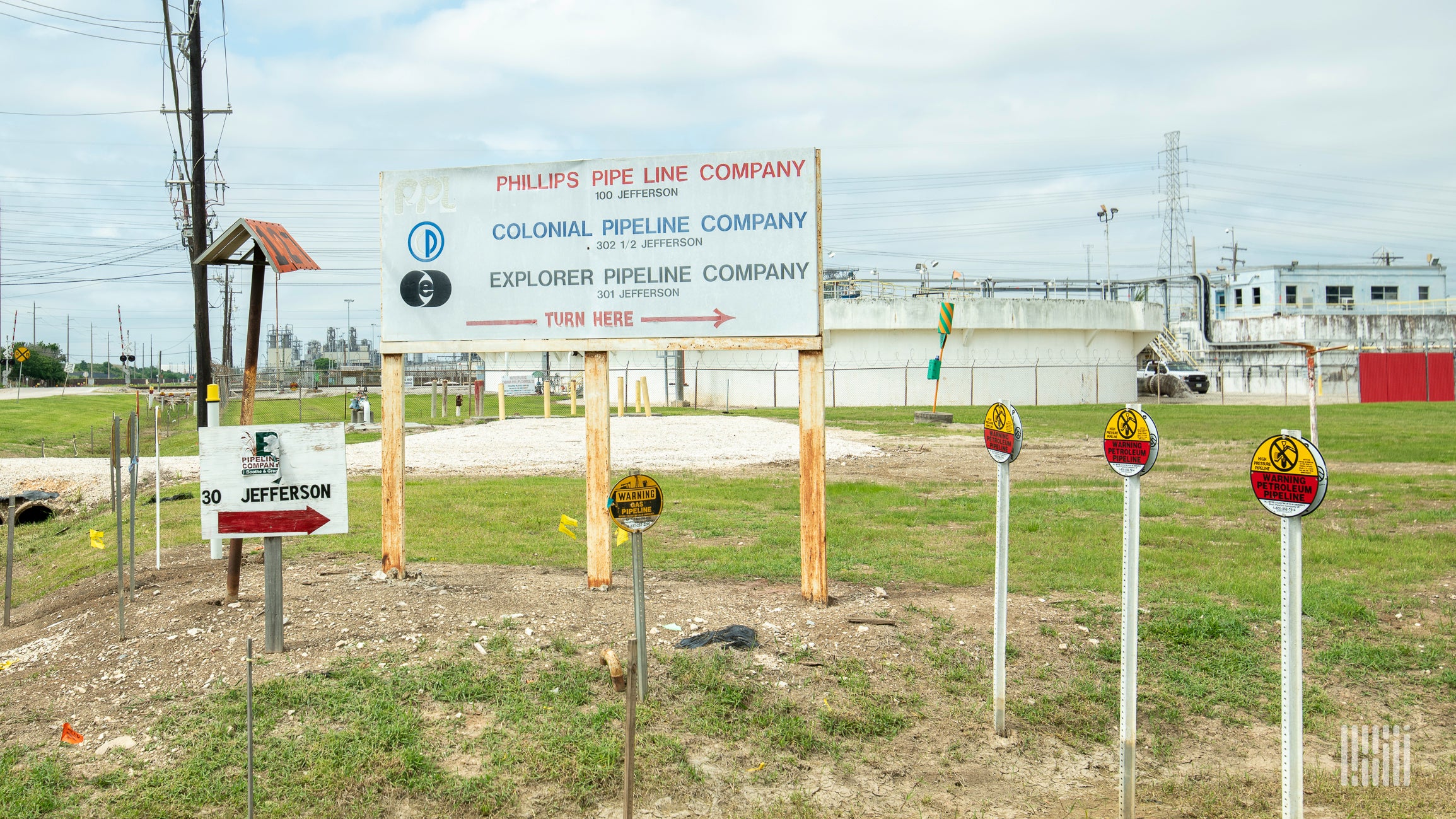 A sign pointing to Colonial Pipeline, which was targeted in a ransomware attack.