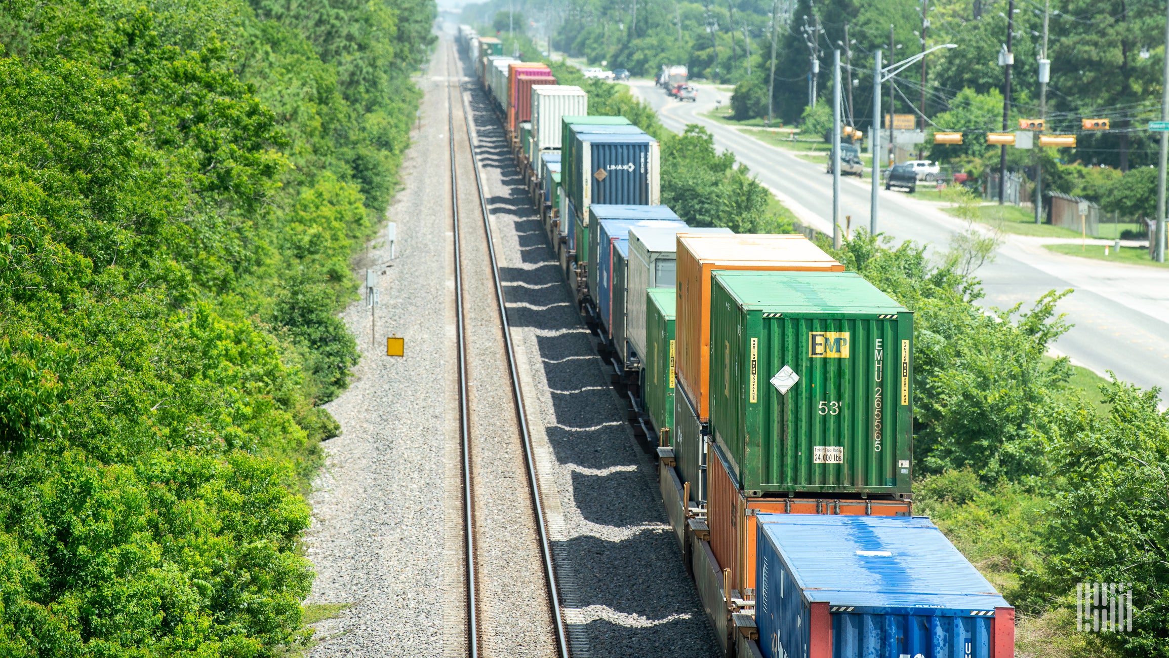 A photograph of a train hauling intermodal containers.