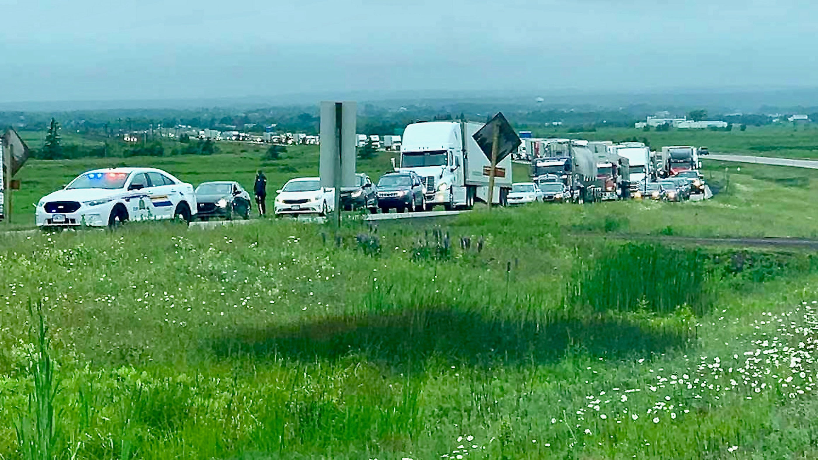 Trucks lined up during a protest blockade at the New Brunswick-Nova Scotia border in Canada.