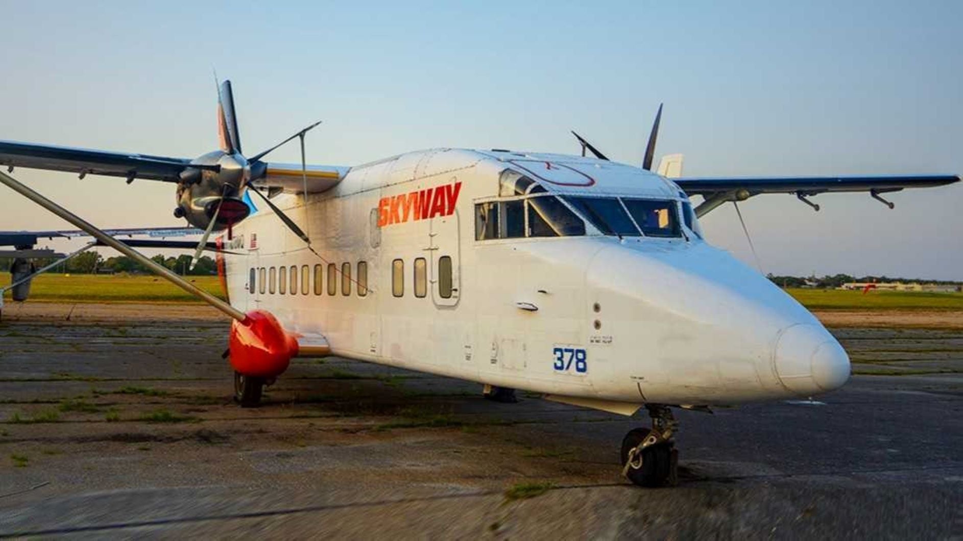 Front view of an twin turboprop cargo plane.