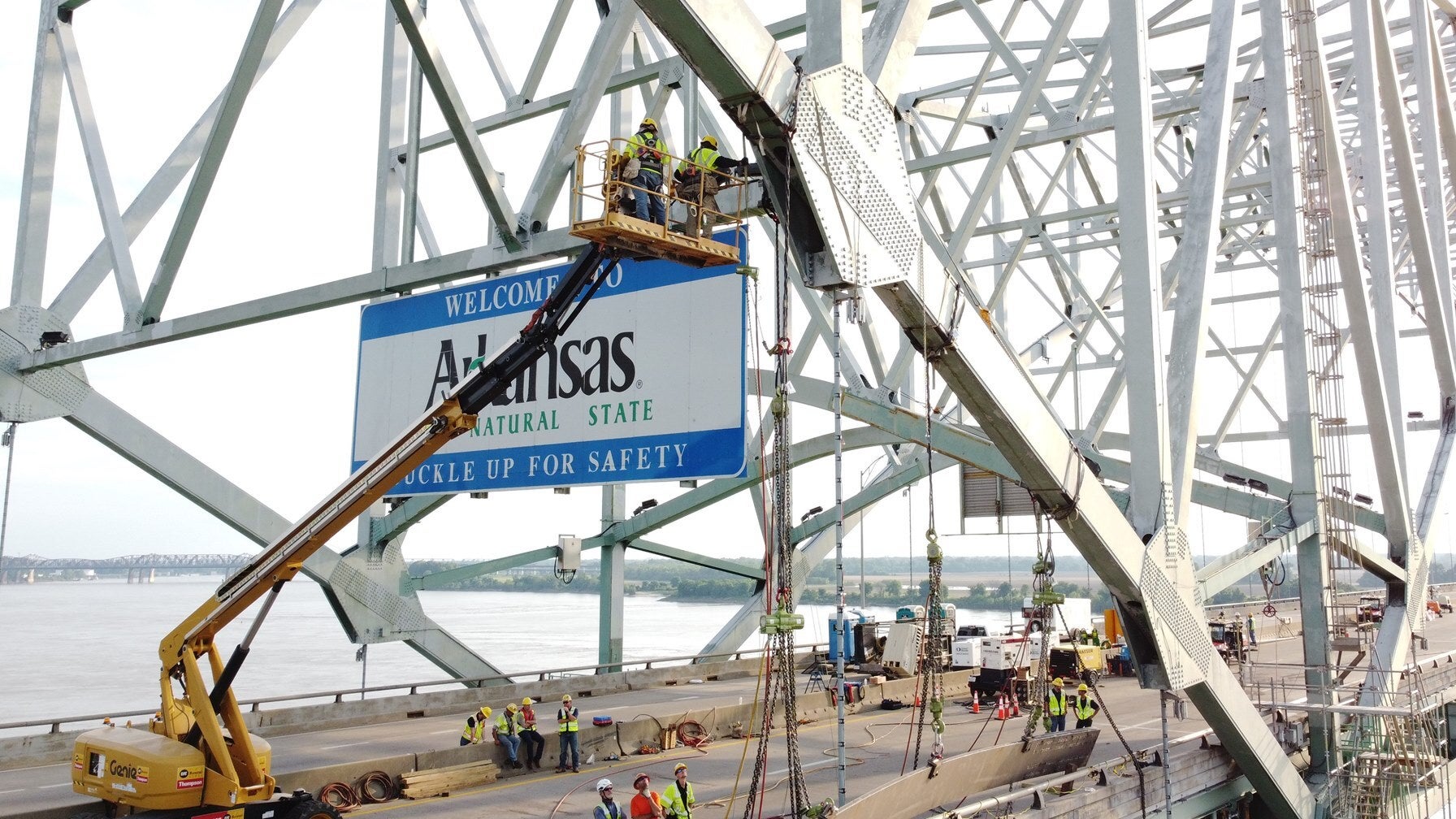 Crew installing steel plates during repairs on the Hernando de Soto bridge on May 22, 2021.