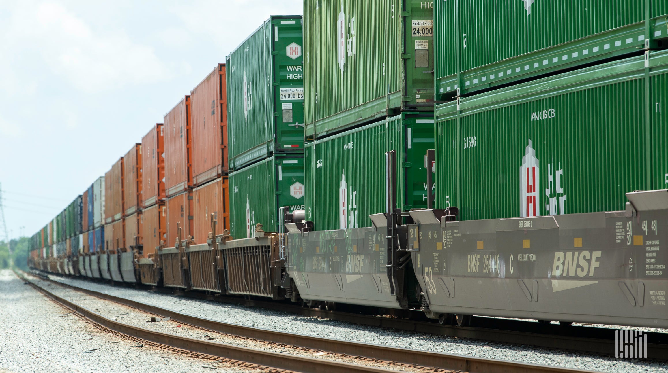 A photograph of a train hauling intermodal containers.