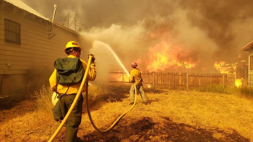 Crews at the Dixie fire in northern California on August 4, 2021.