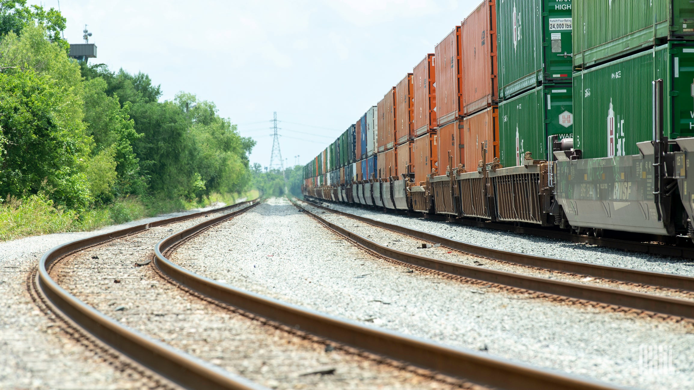 A photograph of a train hauling intermodal containers.