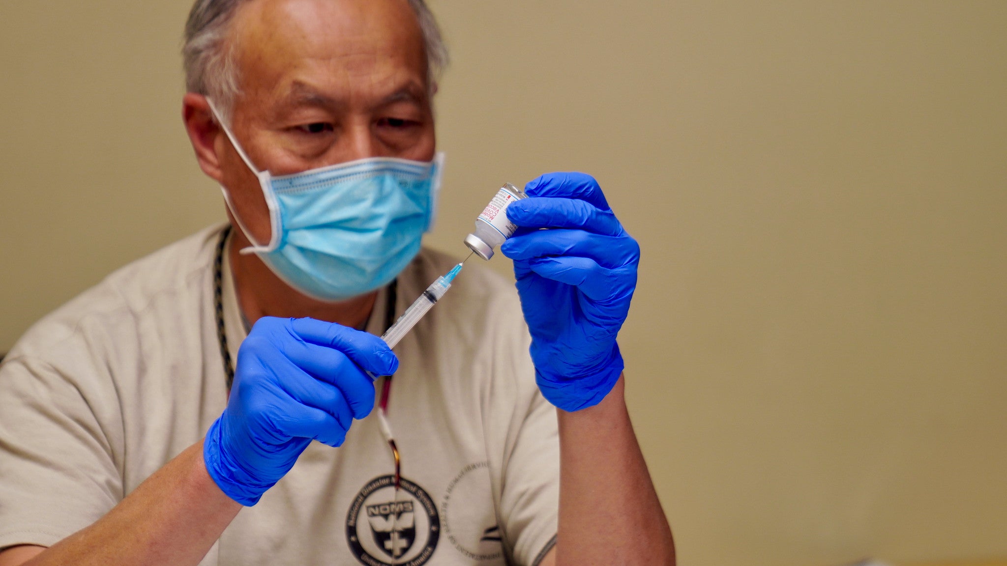 A pharmacist prepares a COVID-19 vaccine in Arizona. (Photo: Department of Health and Human Services)