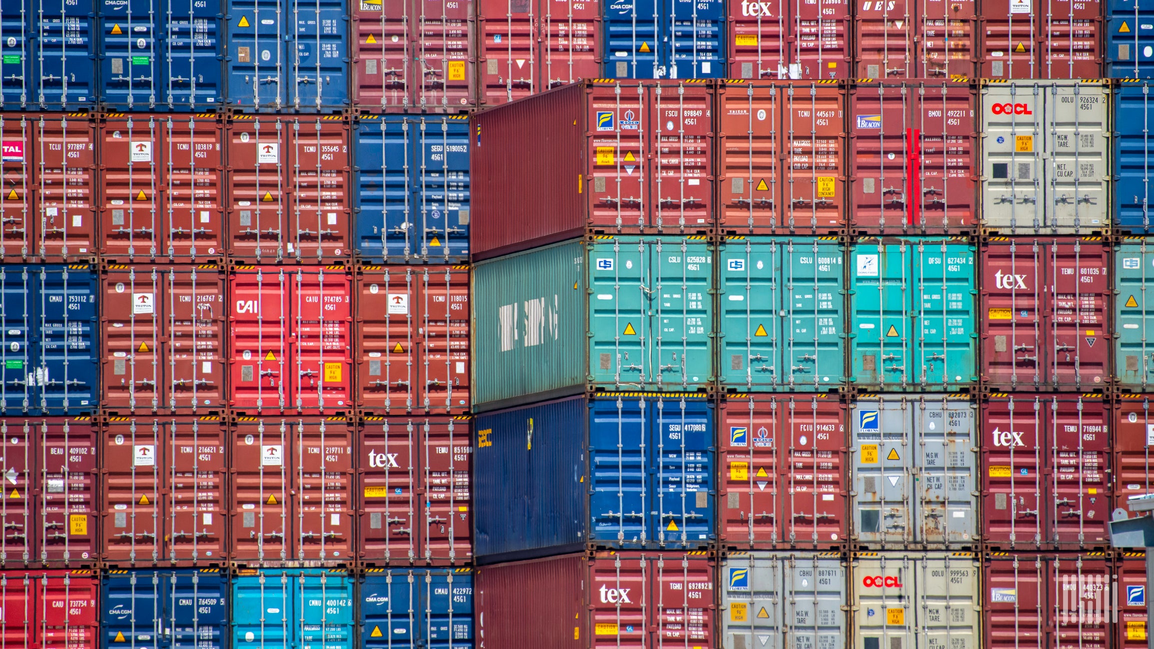 A photograph of a stack of containers.