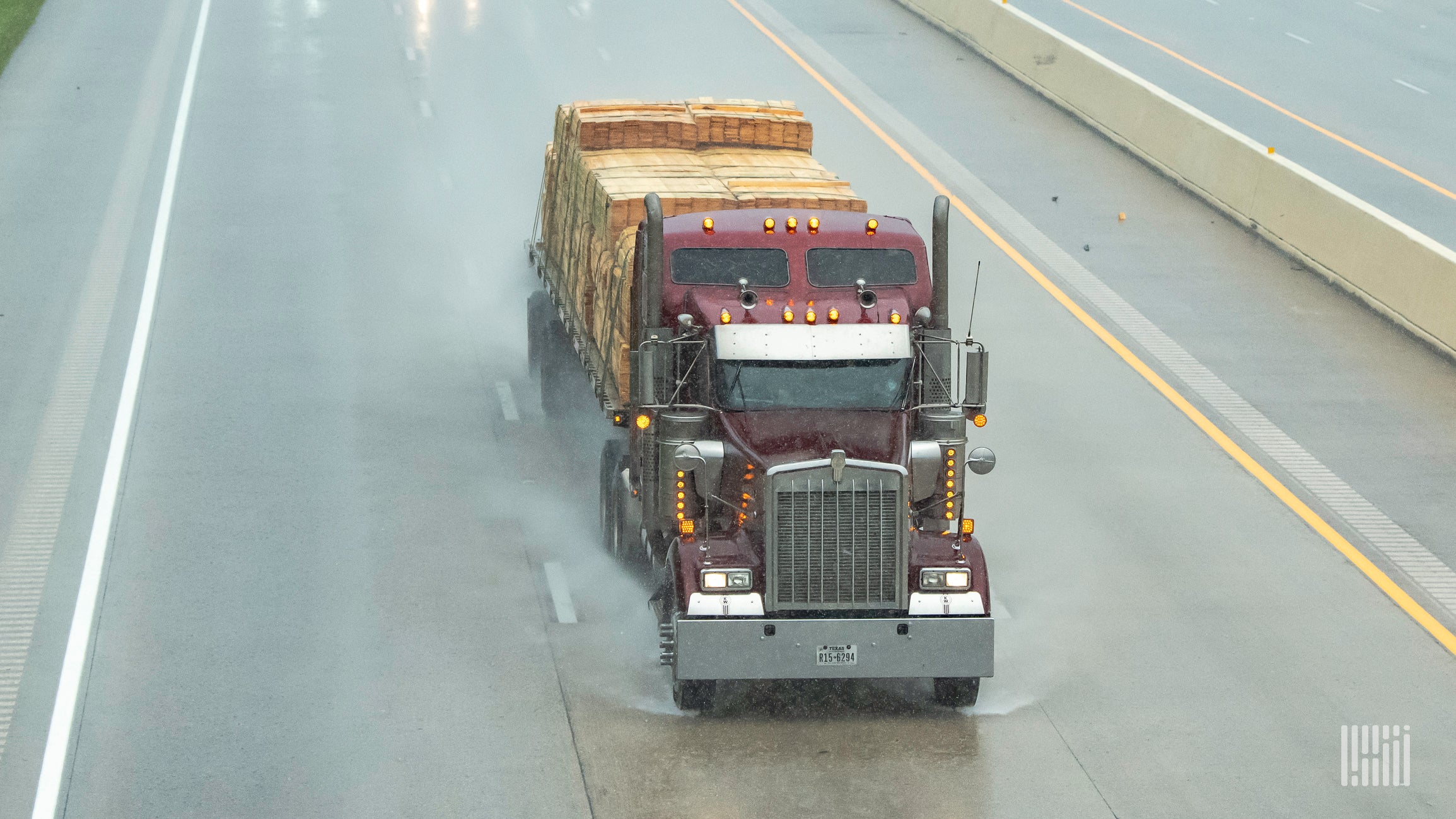 Tractor-trailer in heavy rain.