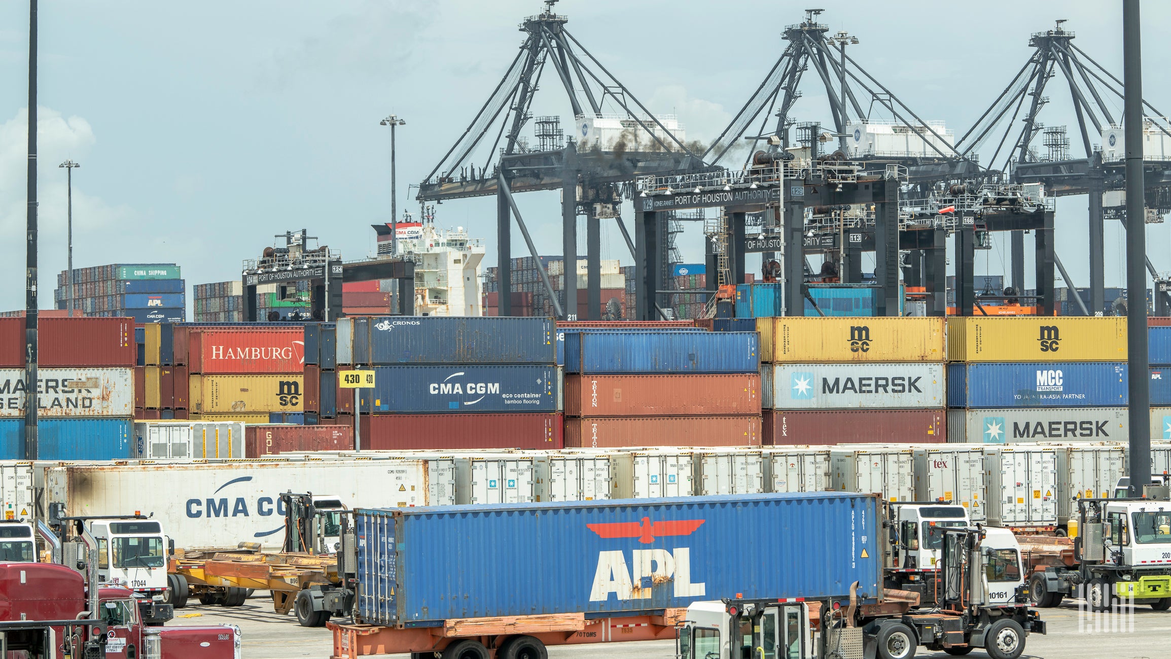 A view of containers being loaded and unloaded at the Port of Houston, where Ports America is a Terminal Operator.