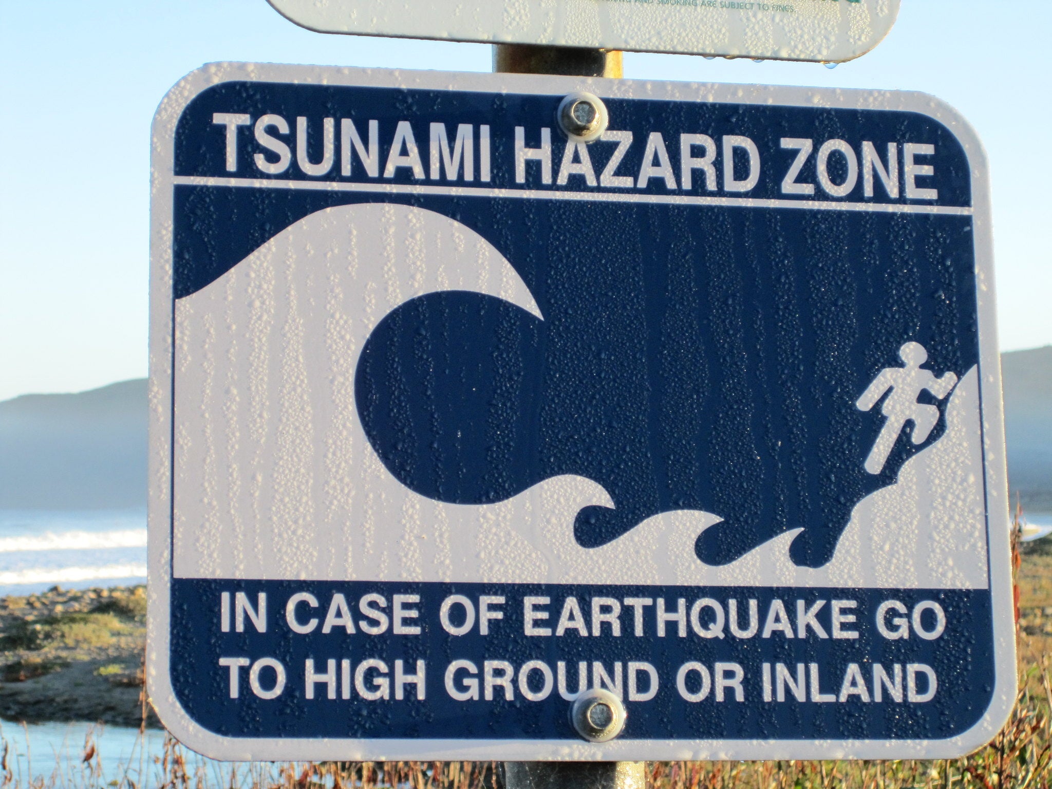 Tsunami evacuation route sign.