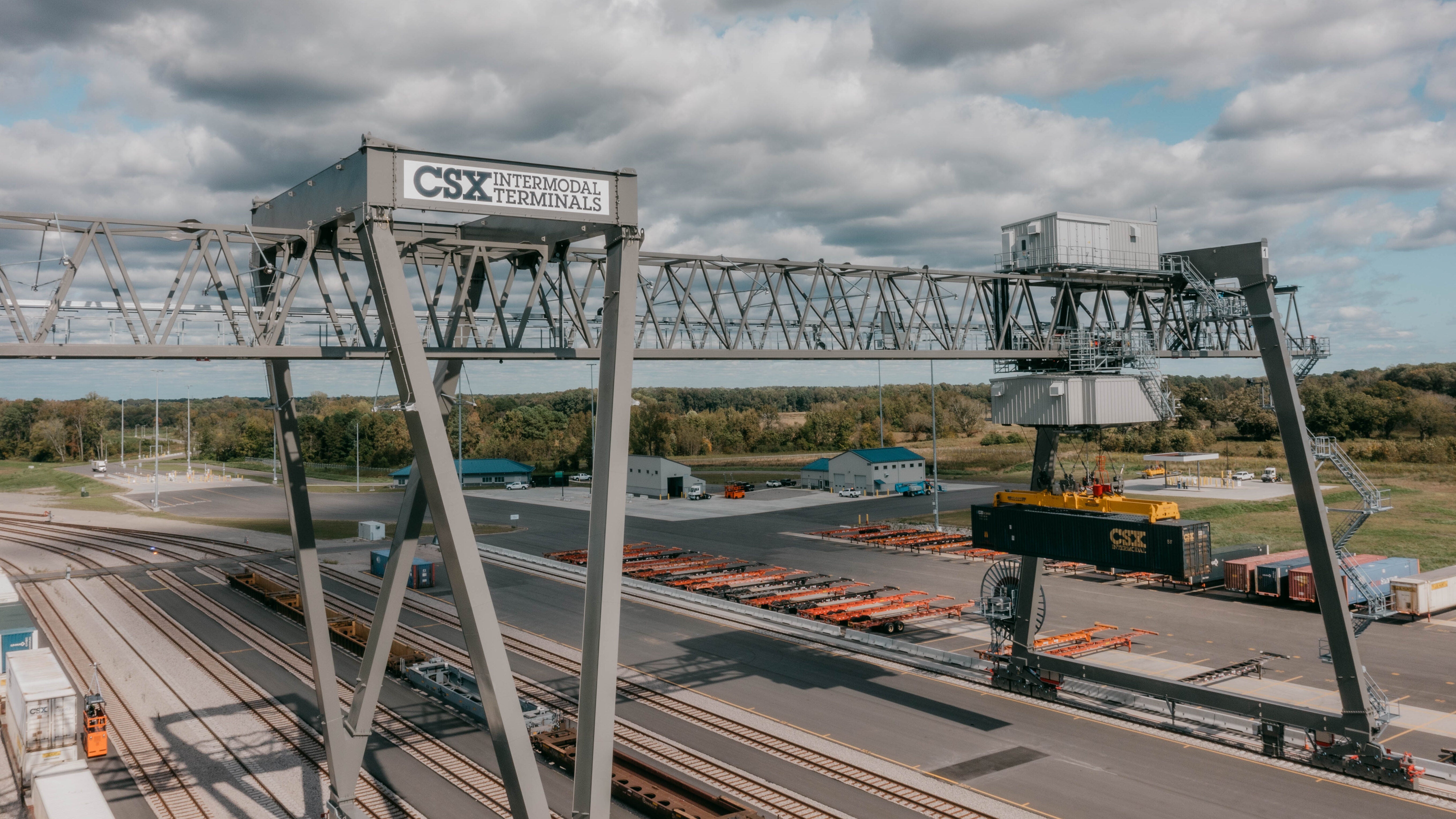 A photograph of CSX cranes at an intermodal terminal