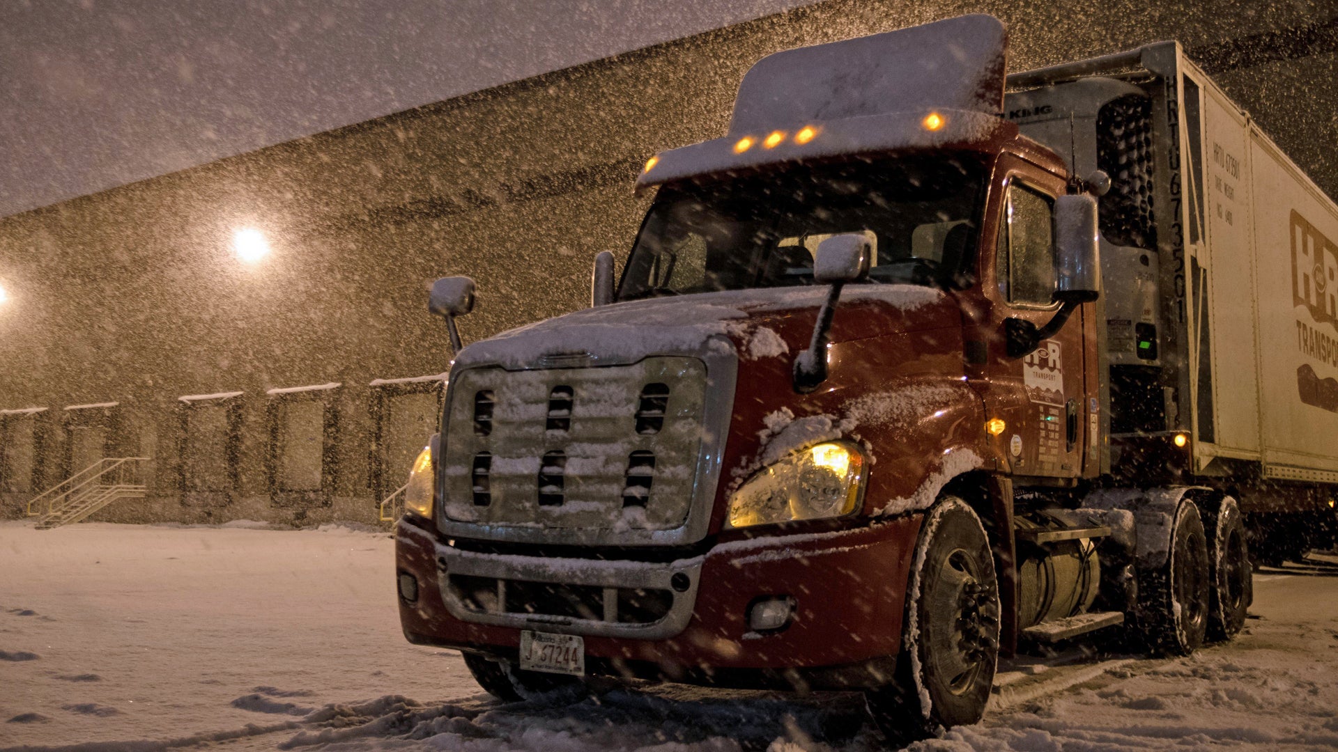 Tractor-trailer in Canada snowstorm.