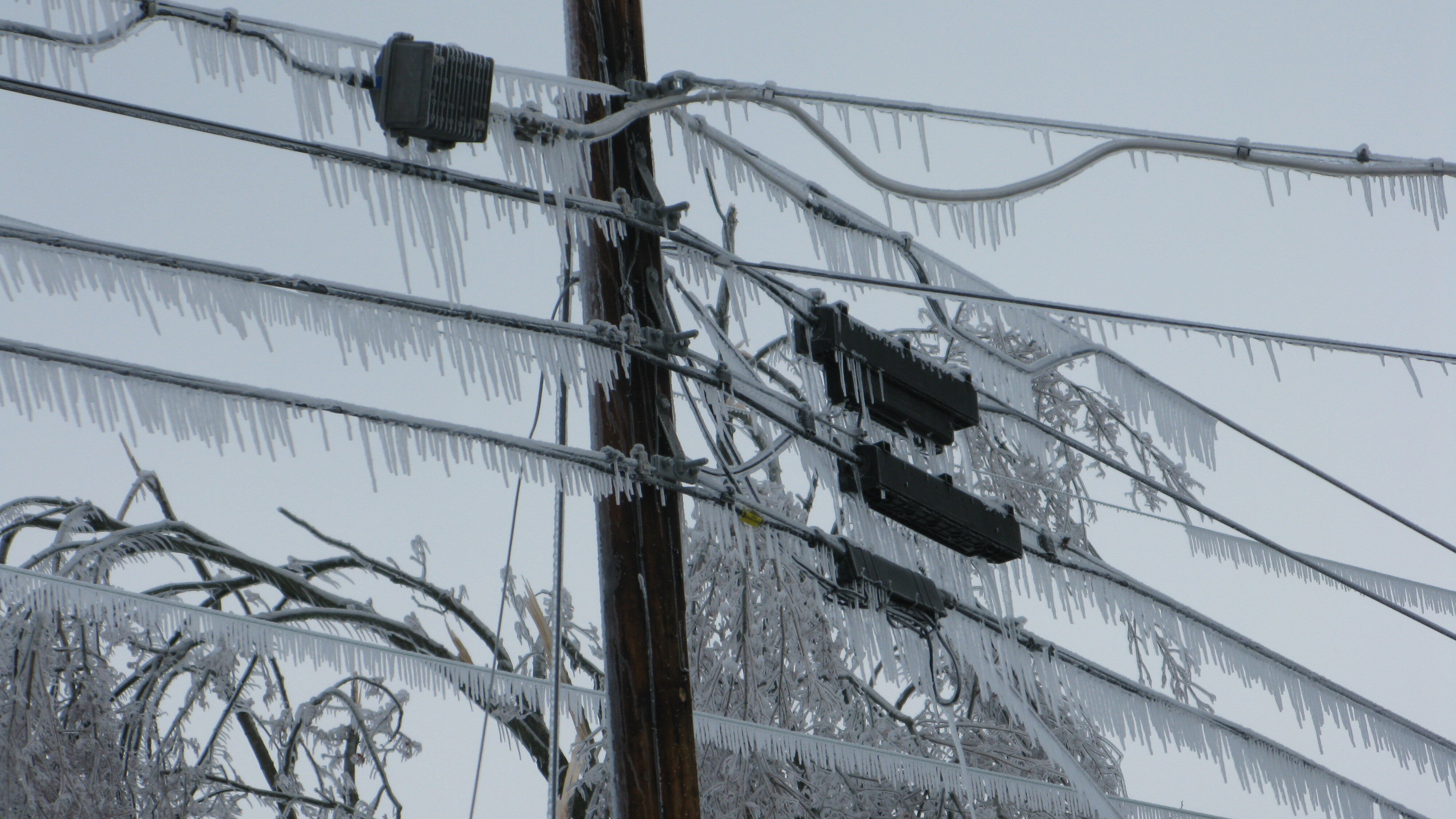 Thick ice covering power lines in Kentucky in January 2009.