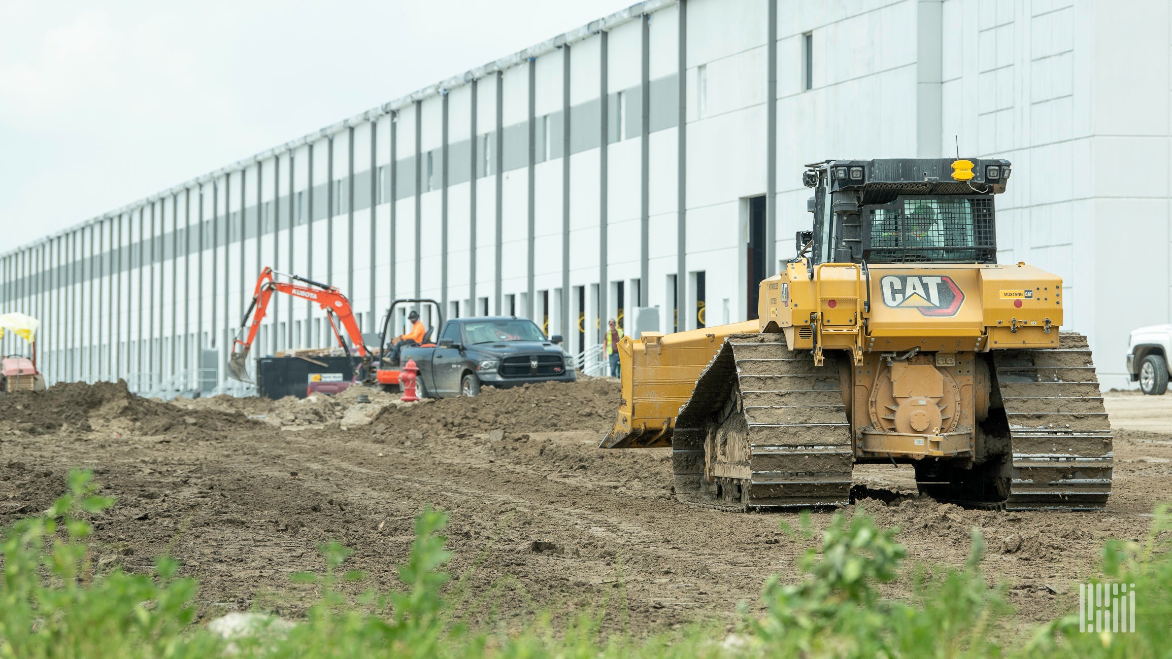 Construction equipment at the site of a logistics warehouse under construction