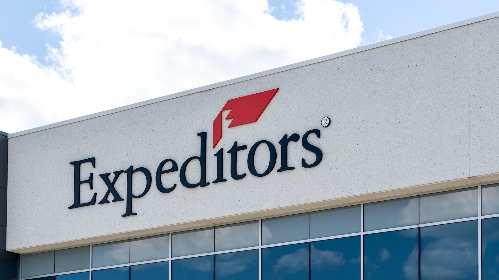 Close up of Expeditors sign. Expeditors is an American logistics and freight forwarding company.