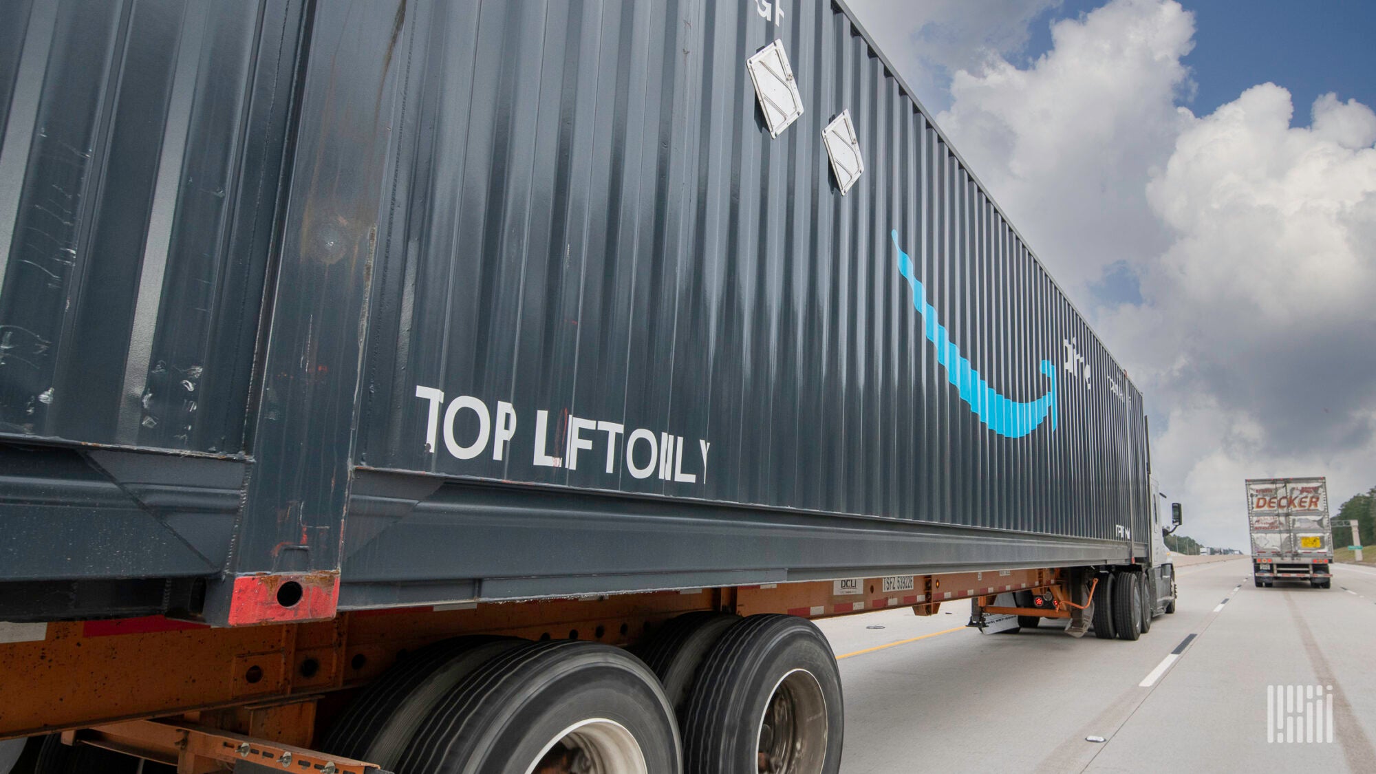 A intermodal container with the logo of Amazon