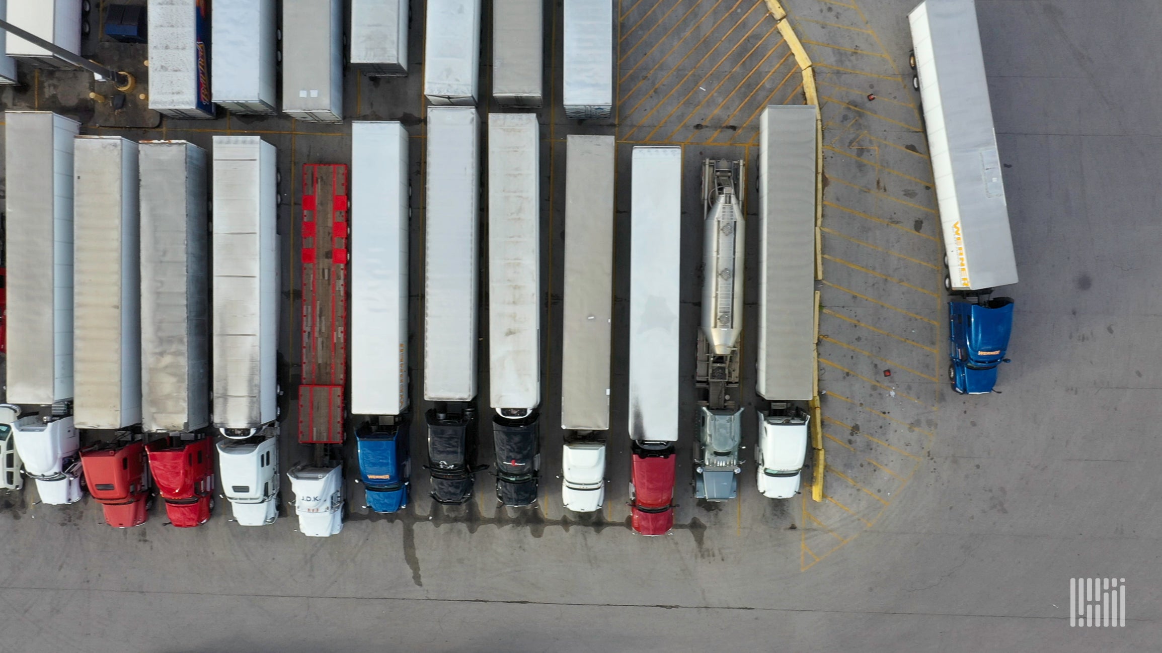 Aerial view of parked trucks.