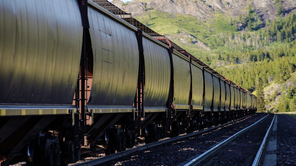 A train hauling hopper cars to illustrate an article about the USDA making rail policy recommendations.