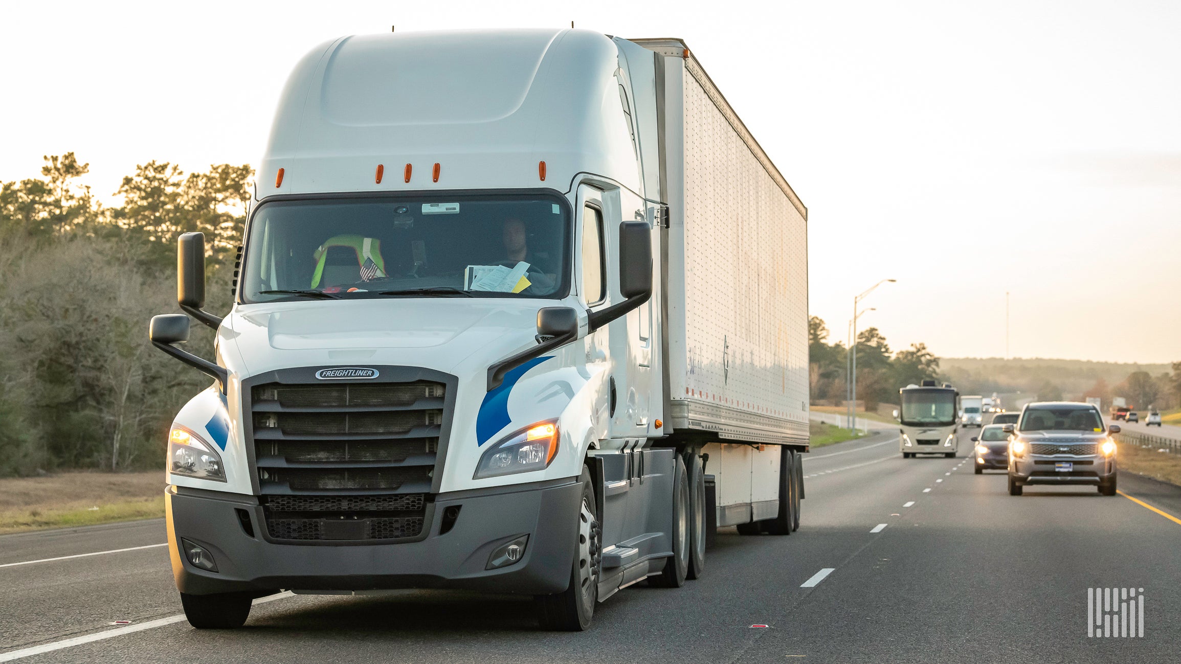 A Freightliner Cascadia on the highway