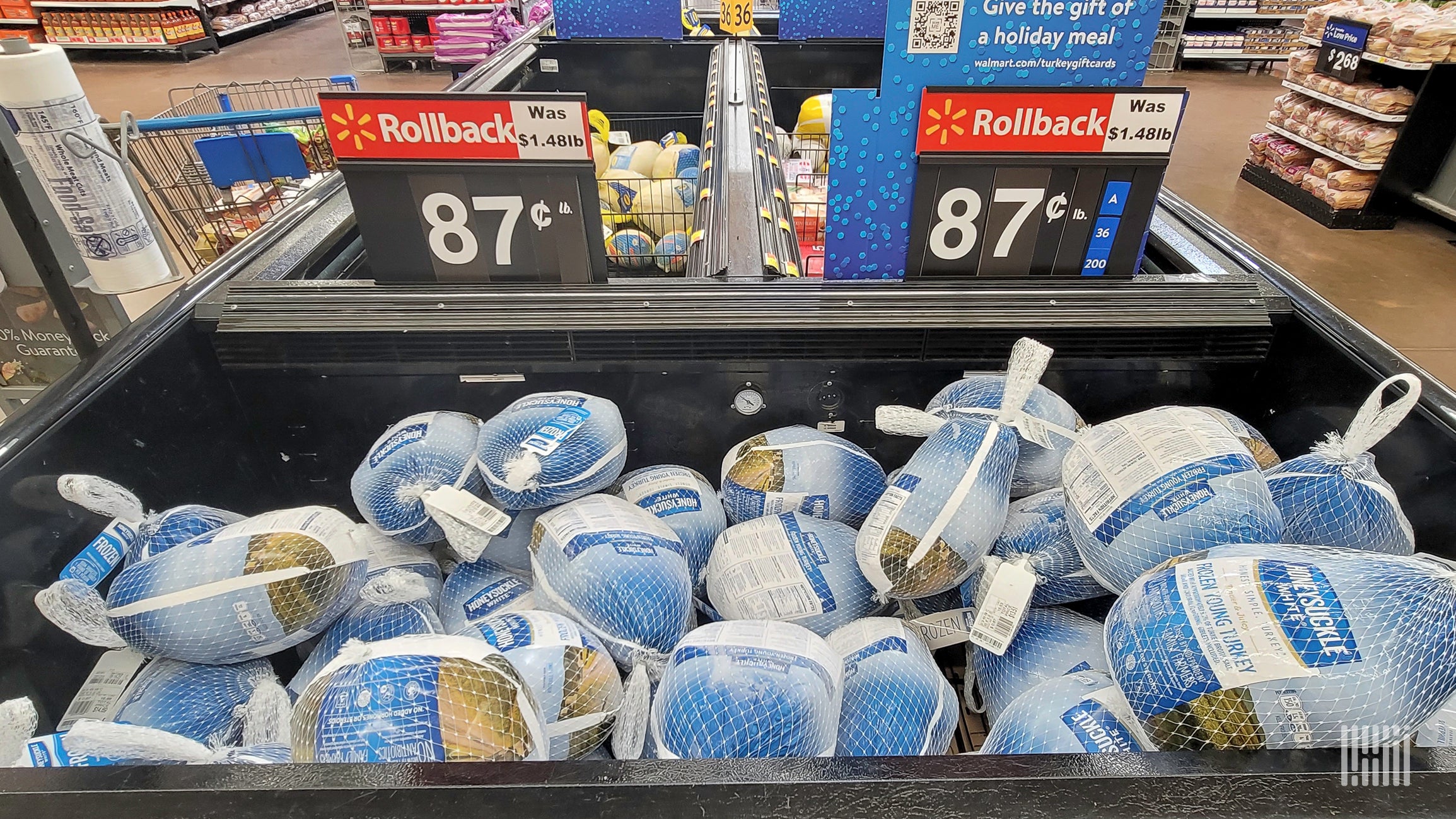 Turkeys are stocked in a freezer bin at a Walmart