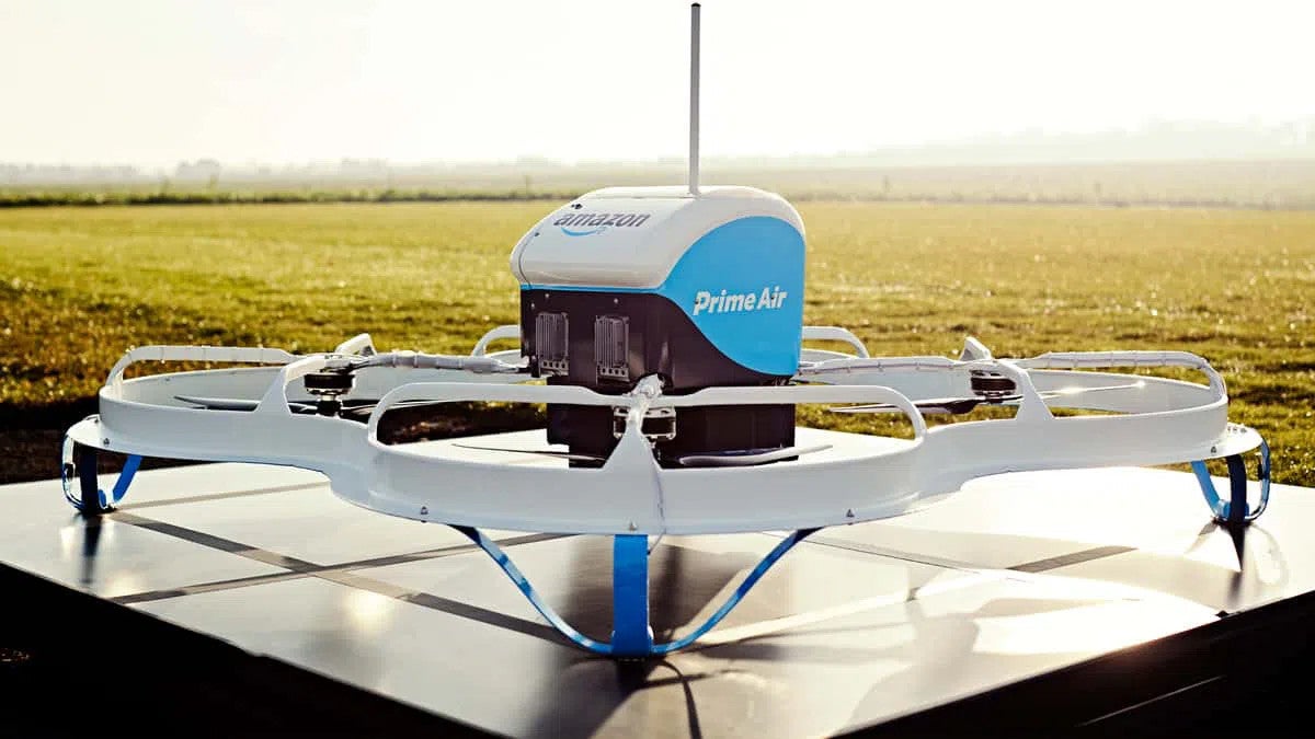 Image of blue and white Amazon delivery drone on launch pad